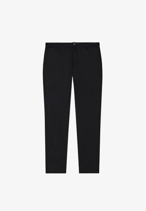 Pantaloni aderenti neri in tessuto misto cotone, con chiusura a zip e bottone, gambe dritte e dettagli di design minimalisti.