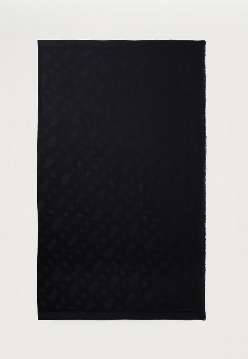 Textil negro tejido con un sutil patrón geométrico, que presenta una textura suave y bordes deshilachados. Forma rectangular, acabado liso.