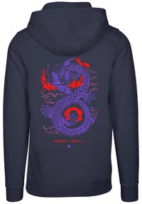 Navy hoodie featuring a large purple dragon graphic with red flames, intricate scales, and stylized text in English and Japanese on the back.