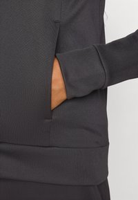 The North Face REAXION HOODED FULL ZIP JACKET - Užtrauktuku užsegamas treningas - black heather