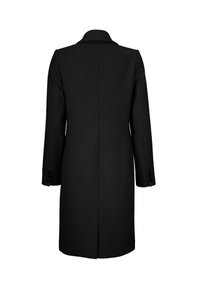Manteau noir mi-long jusqu'aux genoux avec manches longues, détails de boutons sur les poignets et une fente centrale au dos, présenté de dos sur fond blanc.