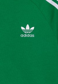 adidas Originals TEE UNISEX - T-shirt med print - green