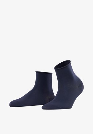 Calze alla caviglia blu navy realizzate in un tessuto morbido ed elastico, con una cuffia a coste e punta senza cuciture per comfort e vestibilità.