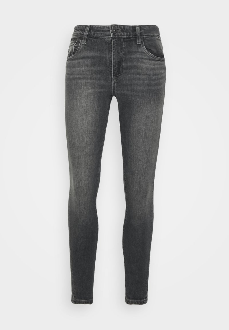 Skinny jeans in dark gray denim, featuring a mid-rise waist, five pockets, and subtle whiskering for texture. Smooth fabric with minimal design.