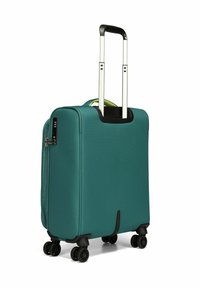 Valise rigide turquoise avec une fermeture éclair noire, roues doubles et poignée télescopique en aluminium ; présente une finition texturée et une poignée de transport supérieure.