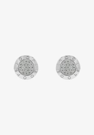 Créoles en argent rondes mettant en valeur un cluster central de petites pierres scintillantes, entourées d'une bordure métallique lisse avec des accents gravés.