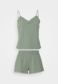Hellgrünes Pyjama-Set mit einem Spaghetti-Träger-Top mit Spitzenbesatz und einer Shorts mit elastischem Bund und Spitzenakzenten am Saum.