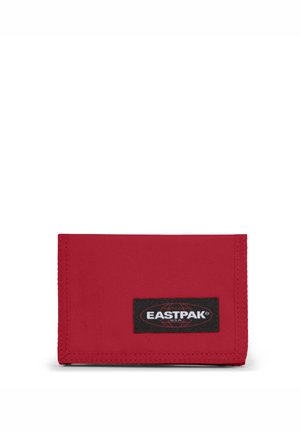 Rode stoffen portemonnee met een gestructureerde afwerking, voorzien van een zwart Eastpak logo patch aan de voorkant. Compact rechthoekig ontwerp met gestikte randen.