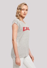 F4NT4STIC DISNEY HIGH SCHOOL MUSICAL EAST - Camiseta estampada - heather grey