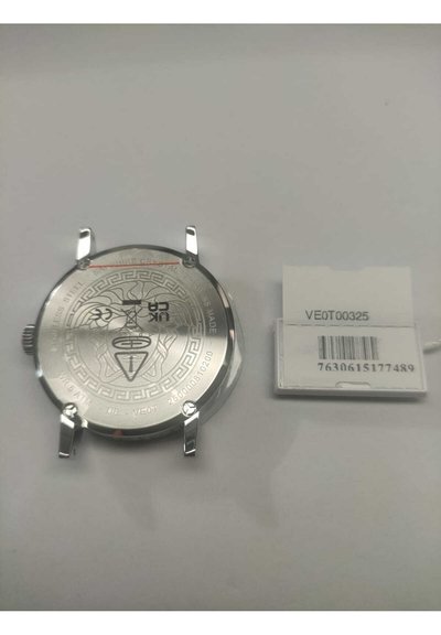 Zegarek ze stali nierdzewnej z wypolerowaną powierzchnią, z misternymi grawerunkami i szafirowym szkiełkiem. Dołączona jest metka z kodem kreskowym.