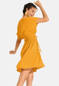 Lisca KARPATHOS CHEEK - Strandaccessoire - jaune