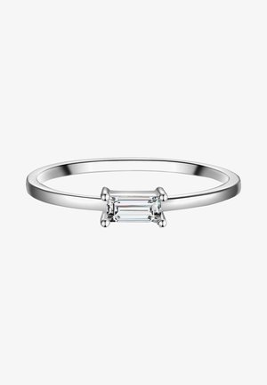 White gold ring featuring a rectangular emerald-cut diamond center stone, smooth band, and minimalistic four-prong setting.