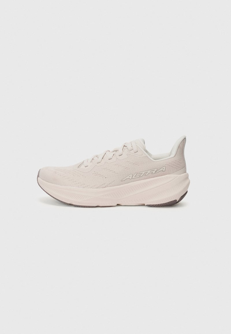 Light pink running shoe with a textured mesh upper, lace closure, cushioned midsole, and a durable rubber outsole. Brand name ALTRA visible.