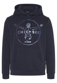 Mörkblå huvtröja i bomull med en framficka och en metallisk grafisk tryck av en figur med utsträckta armar.