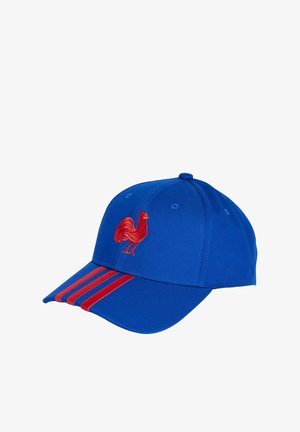 Casquette en coton bleu avec broderie rouge d'un coq et trois rayures rouges sur la visière. Elle dispose d'œillets de ventilation et d'une visière incurvée.