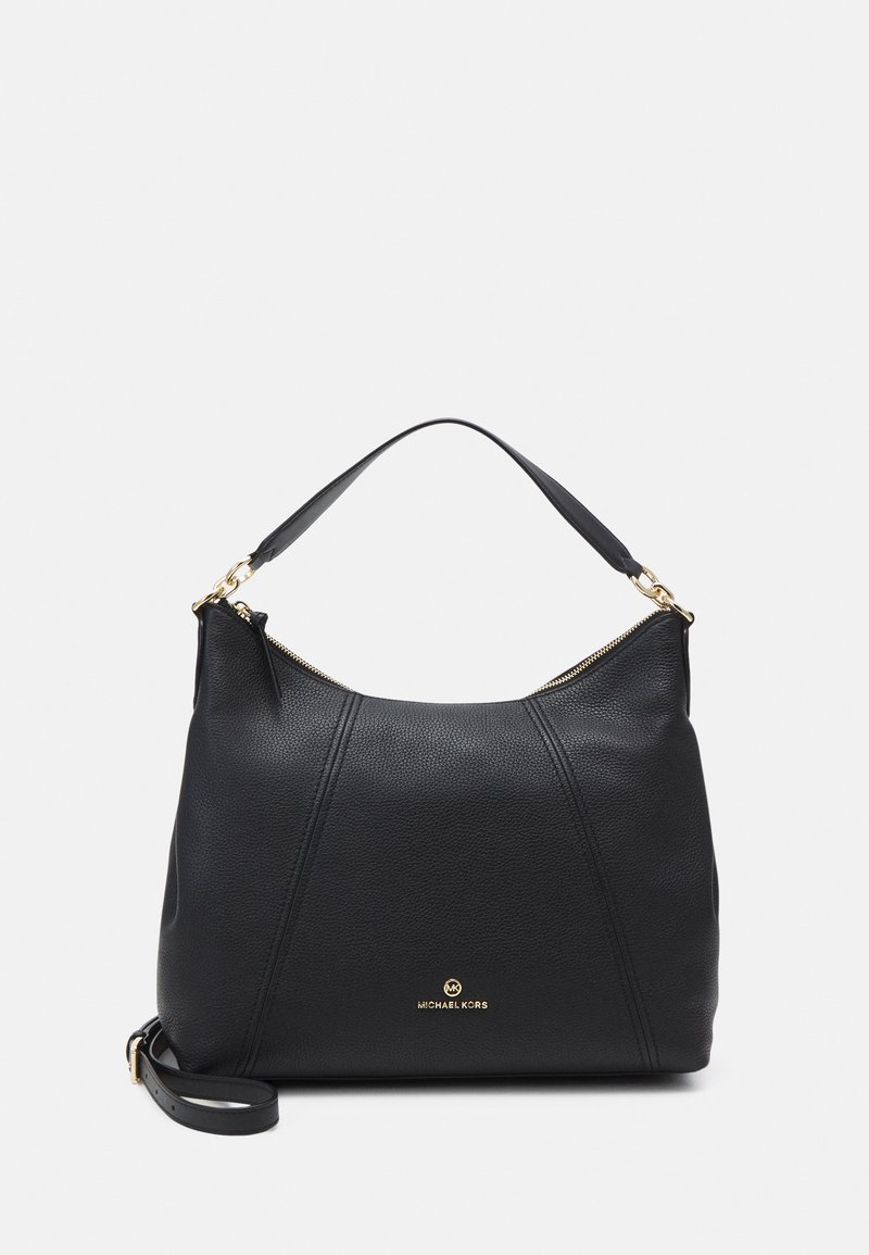 Sac à main Michael Kors en cuir noir avec poignée supérieure, ferrures dorées et bandoulière amovible sur fond blanc.