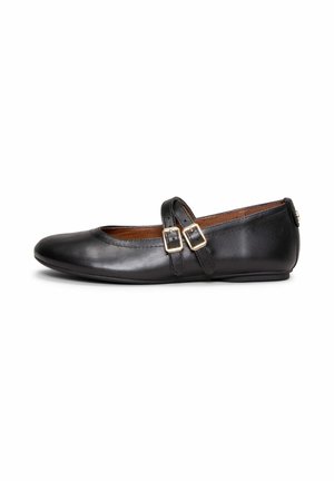 Zapato plano Mary Jane de piel negra con dos correas doradas con hebilla y puntera redondeada, mostrado sobre un fondo blanco.