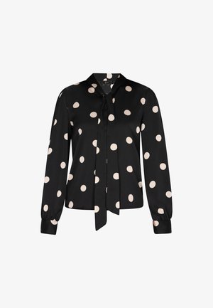 Zwarte blouse met een kraag en een strikje bij de halslijn, lange mouwen en grote crèmekleurige stippen op een gladde stof.