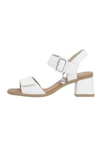 White heeled sandals featuring a square toe, wide strap with a buckle, and a block heel. Material appears smooth, with a neutral insole.