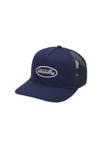 Casquette trucker bleu marine avec un front solide, un dos en maille et un logo Billabong brodé sur le devant. Elle possède une visière incurvée et un design structuré.