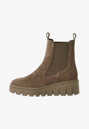 Brun mockaskinnsankelsko med elastiska paneler, rund tå och tjock gummisula med en strukturerad, räfflad design.