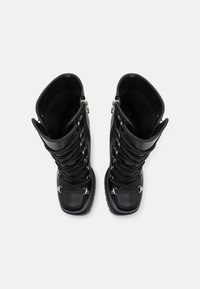 RAID KAMALA - Botines con plataforma - black