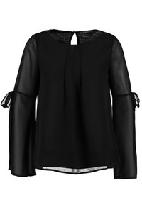 Svart blus med genomskinliga långa ärmar, detalj med nyckelhål i ryggen och knytningar vid muddarna. Har en avslappnad passform och mjuk tygtextur.