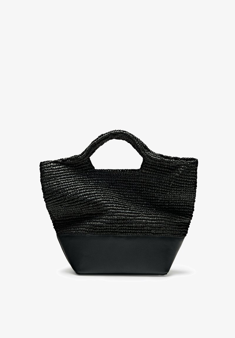 Sac fourre-tout noir avec une texture tissée sur la partie supérieure et un bas en similicuir lisse, doté de deux poignées courtes et d'une base structurée.