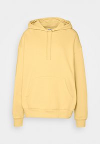 Yellow hooded sweatshirt with a kangaroo pocket, made of soft fabric, featuring a relaxed fit and ribbed cuffs and hem.