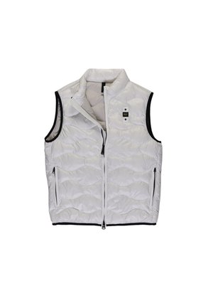 Gilet bianco imbottito con zip frontale, dettagli neri e due tasche laterali con zip. Presenta una texture imbottita e un collo alto.