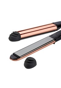 Lisseur avec des plaques en cuivre brillant et des accents en caoutchouc noir. Comprend des coussinets de protection en silicone inclinés. Design compact et rectangulaire.