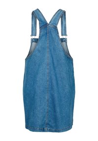 Denim overall obleka v svetlo modri barvi. Ima nastavljive naramnice, velike stranske žepe in dolžino do sredine stegen z ravnim krojem.