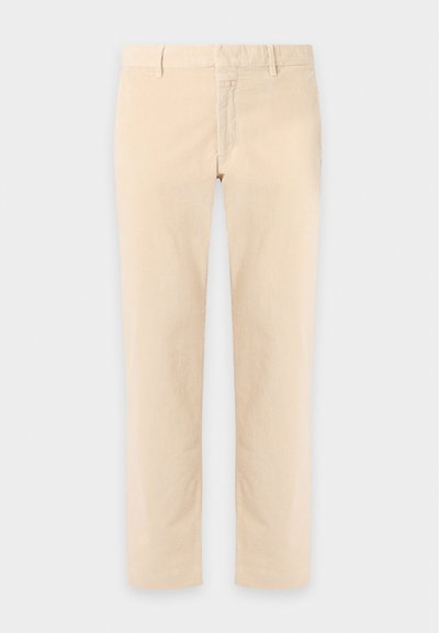 Pantalon en velours côtelé beige à jambes droites avec passants pour ceinture et fermeture avant par bouton et fermeture éclair.