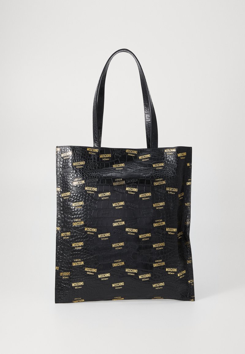 Black faux crocodile leather tote bag with yellow logo details. Features long handles and a structured rectangular shape.