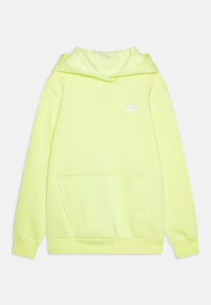 Hoodie jaune fluo en tissu à la texture lisse. Présente une capuche, une poche avant et un logo Nike blanc sur la poitrine.