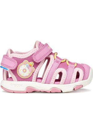 Sandalia infantil rosa con malla transpirable, correas ajustables, suela de goma y decoración de dona con unicornio en el lateral.