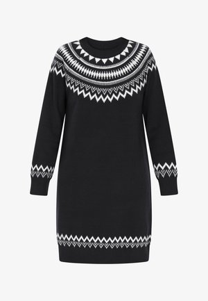 Black knitted dress with long sleeves, featuring a white geometric pattern around the neckline and hem. Soft, textured fabric.