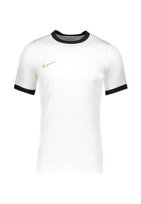 T-shirt athlétique blanc en tissu synthétique lisse, avec un col et des poignets côtelés noirs, et un logo Nike doré sur la poitrine.