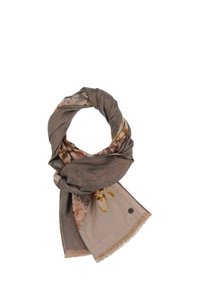 Sciarpa con motivo floreale in tonalità terrose di marrone e blush, realizzata in tessuto morbido con bordi frangiati e un piccolo logo decorativo.
