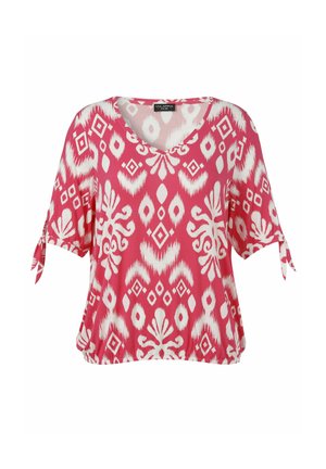 Pink short-sleeve blouse with white abstract geometric and floral patterns, V-neckline, and small bows on the sleeve ends.