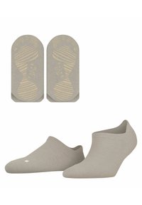 Calzini beige alla caviglia con una superficie in maglia texturizzata. Motivo antiscivolo e branding sulla suola. Bordo liscio per una vestibilità a profilo basso.