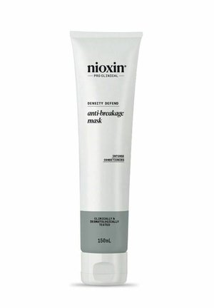 Nioxin Density Defend anti-breekmasker in een tube van wit en grijs, 150ml, met zwarte tekst en een flip-topdeksel.
