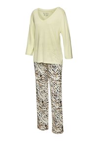 Lichtgele, V-hals lange mouwen top met een losse pasvorm, gecombineerd met gestreepte broek in beige, zwart en wit. Zachte stof, casual ontwerp.