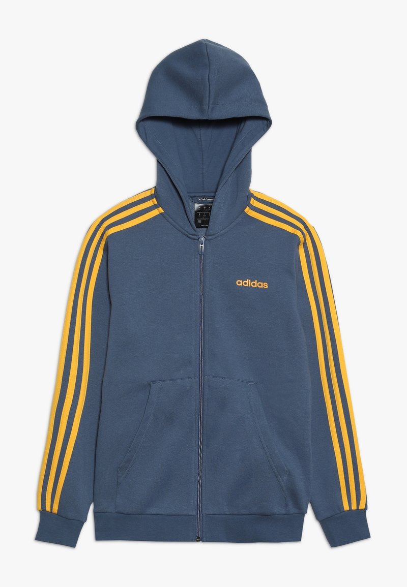 Blue zip-up hoodie with yellow Adidas stripes along sleeves and small Adidas logo on chest, featuring front pockets and cuffed sleeves.