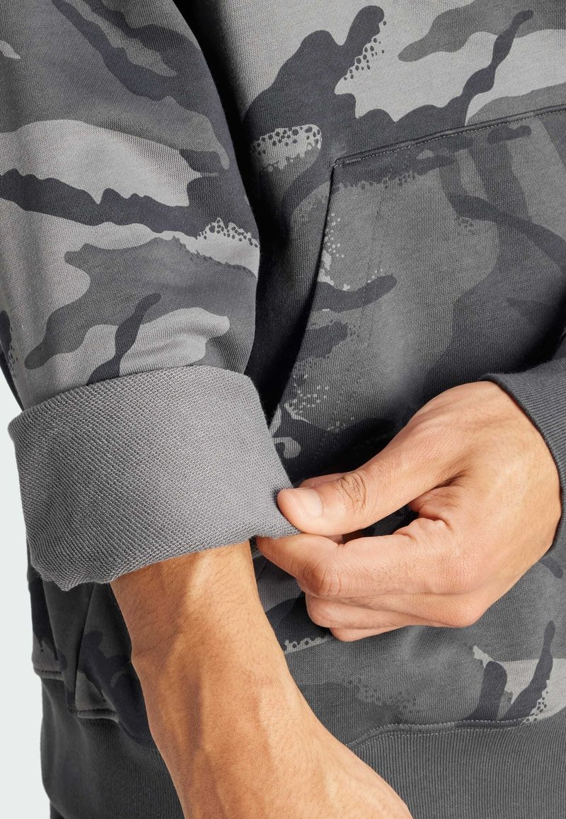 Caterpillar Sweat à capuche doublé performance pour homme, noir, taille XL, Noir/blanc