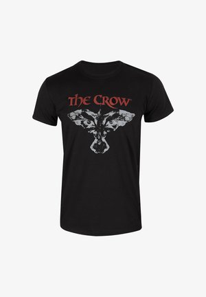 Zwarte katoenen t-shirt met een grafisch ontwerp van een raaf en de tekst "The Crow" in het rood, centraal op de voorkant geplaatst.