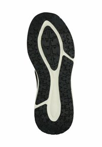 Suela de zapatilla deportiva negra con una parte inferior de goma texturizada negra, detalles en blanco y un patrón distintivo para mayor tracción.