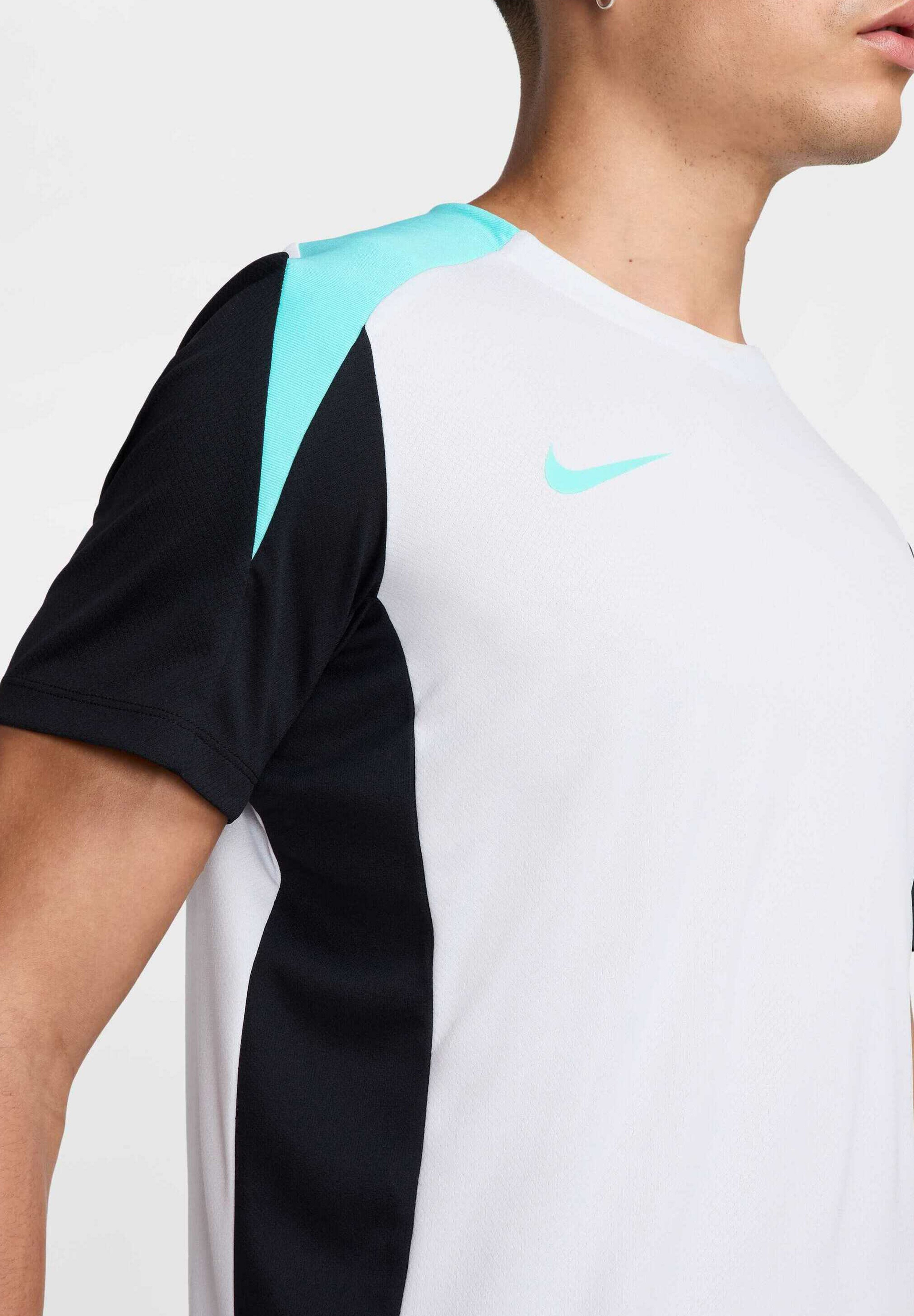 turquoise and black nike shirt