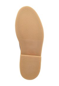 Zehentrenner aus Gummi mit einer strukturierten Oberfläche, abgerundetem Absatz und geprägtetem Logo. Entwickelt für Grip und Langlebigkeit.