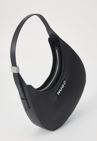 Black leather shoulder bag with a curved shape, silver zipper, and logo detail. Features a wide strap and smooth texture.